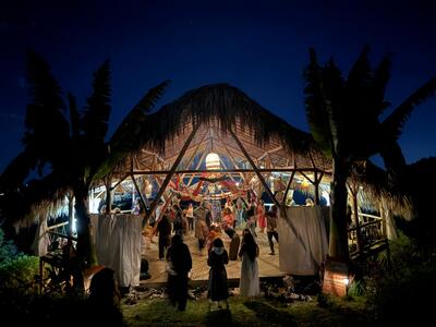 Medellín Ecstatic Dance Festival — venue exterior at night